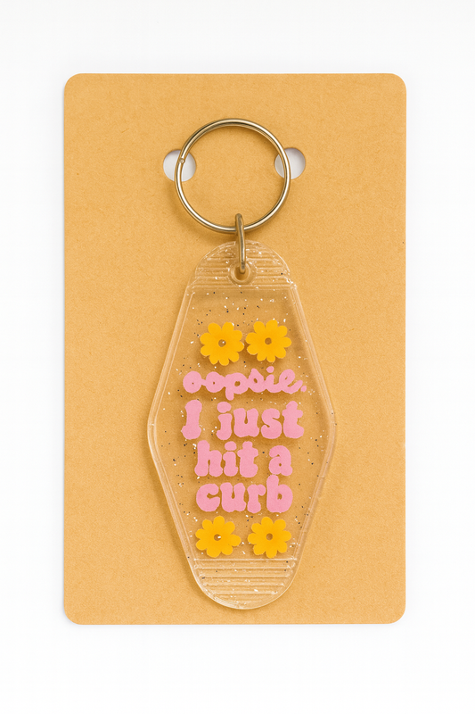 Oopsie I just hit a curb Motel Keychain