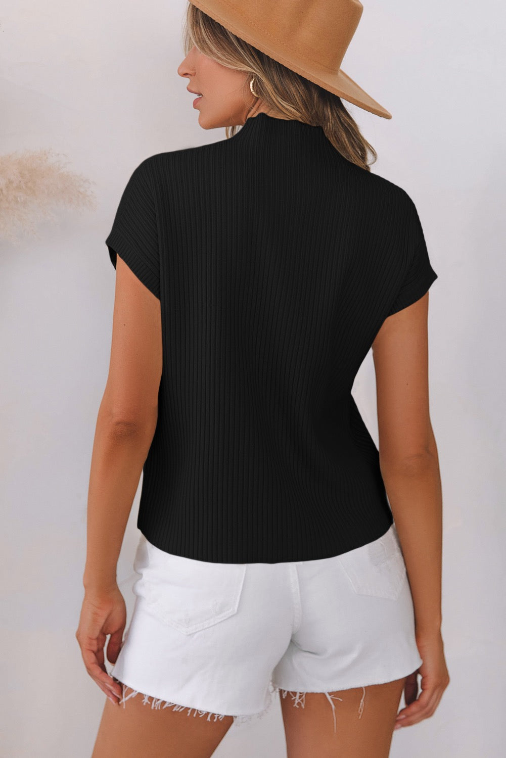 Black knitted pocket short sleeve sweater